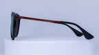 Sunglasses with black frame and red accents on a white background