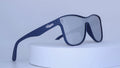 Blue sunglasses with Vybrance logo on a white background