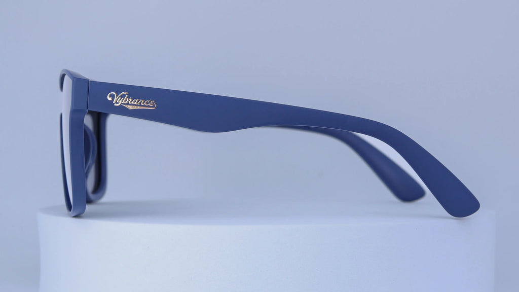 Blue sunglasses with Vybrance logo on a white background